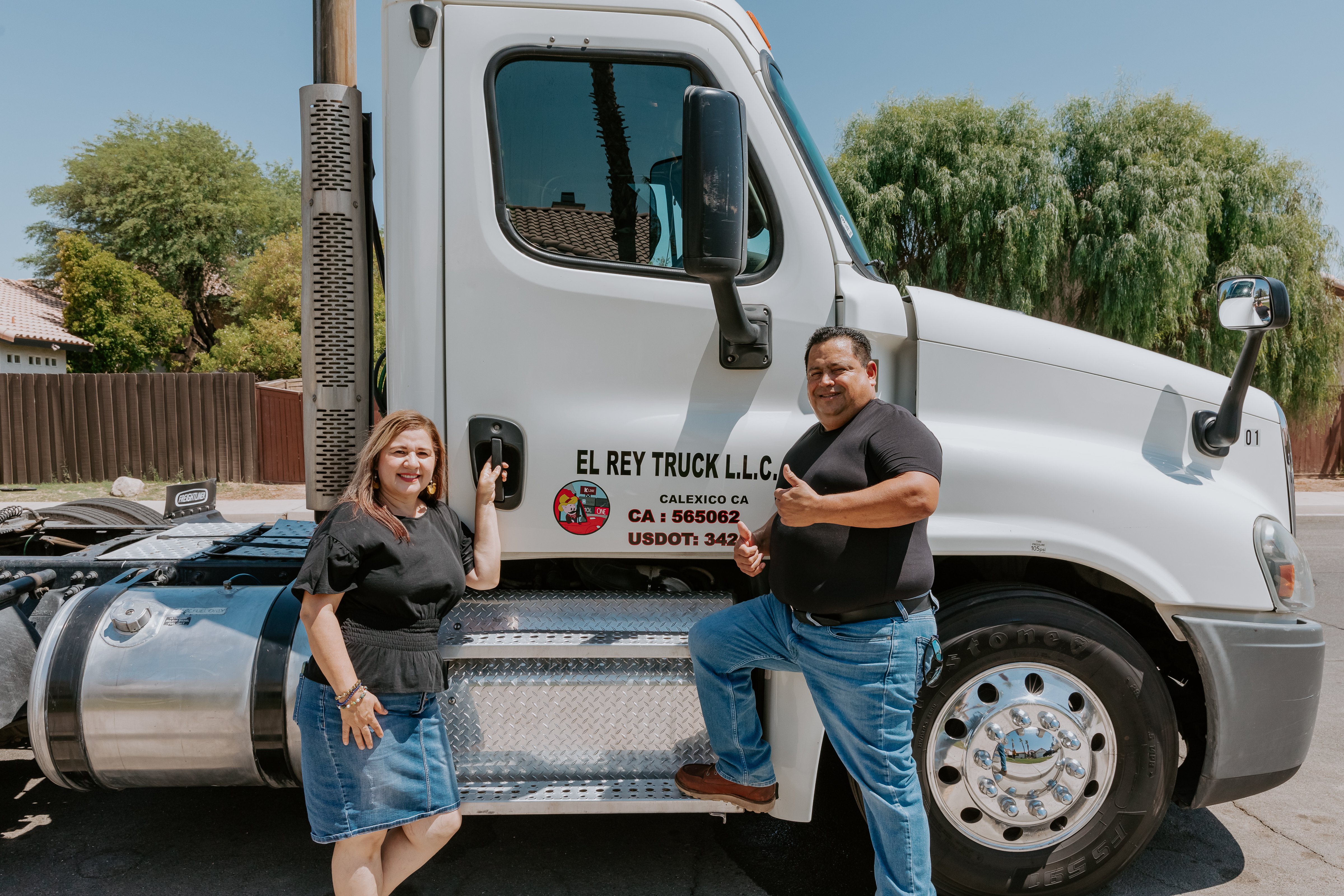 truck with two people standing in front